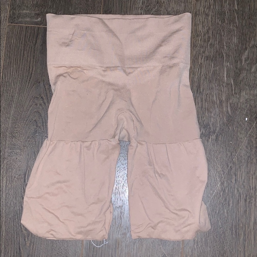 Tan spanks